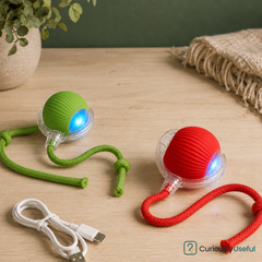Red and green rechargeable smart rolling pet balls with braided ropes and USB charging cable
