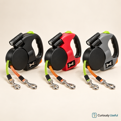 Black, red and grey colour options of the dual retractable dog lead displayed side by side.