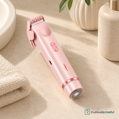 Pink women’s dual-ended shaver with trimming comb fitted and rotary shaving head
